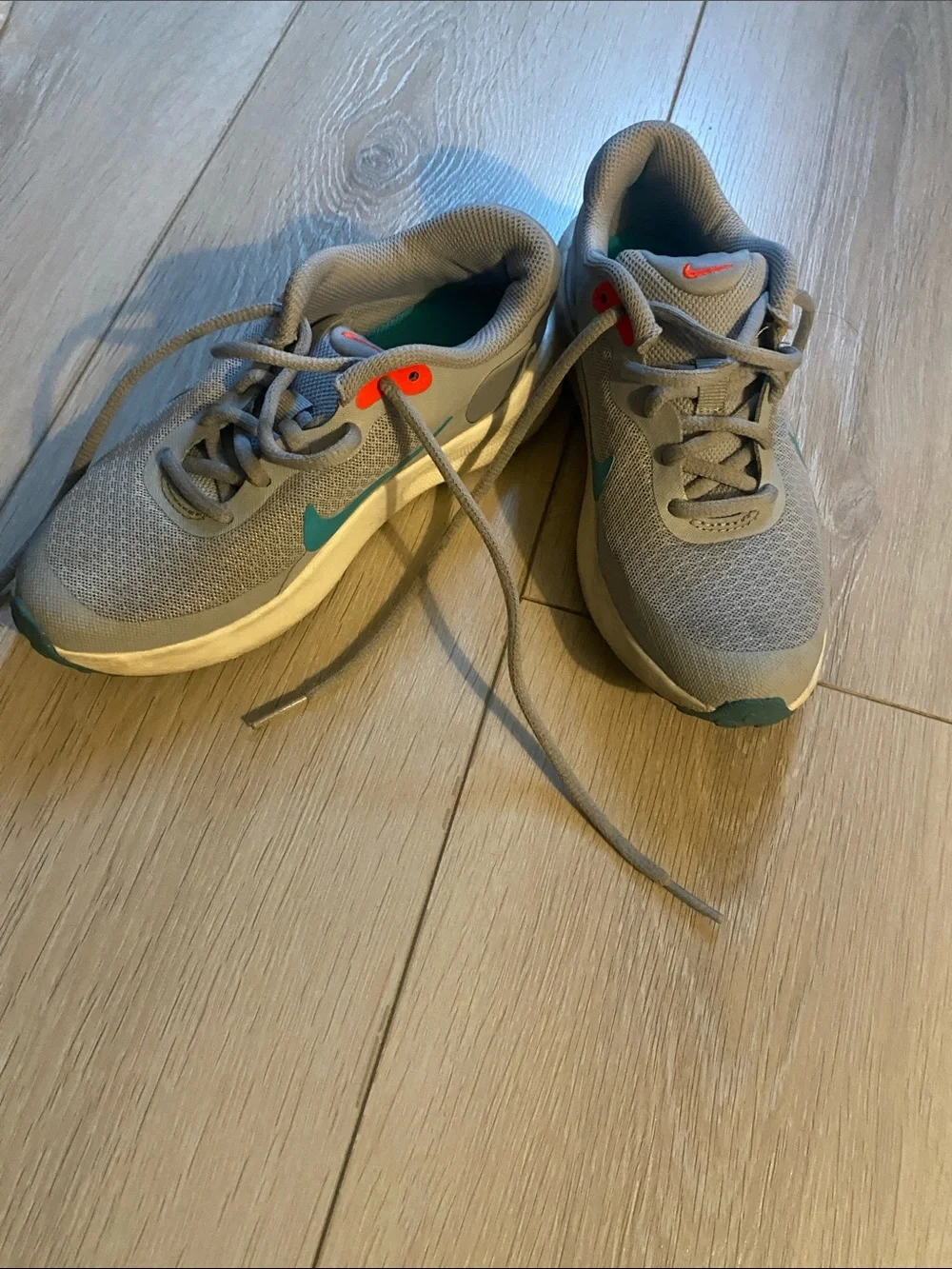 Nike Kids Gray Sneakers with Teal and Coral Accents